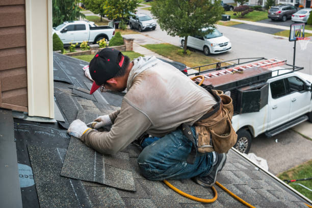 Professional Roof Replacement technician working in Finley, ND